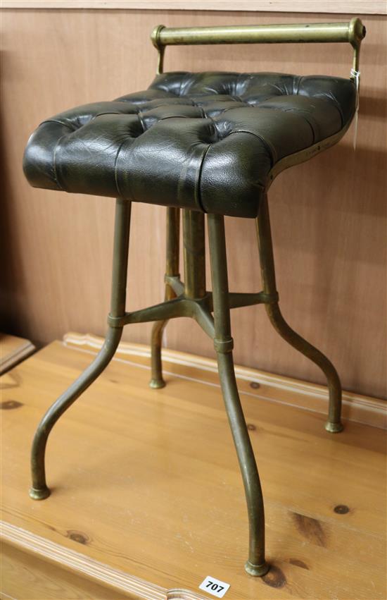 A brass harpists stool